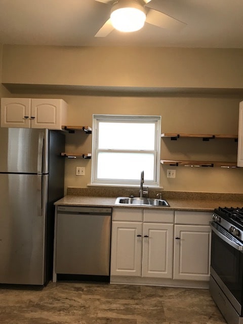 New kitchen with ceiling fan - 765 Delta Ave