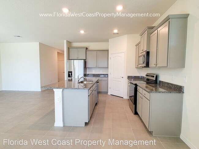 Building Photo - 4 br, 2 bath House - 5715 Oak Bridge Ct