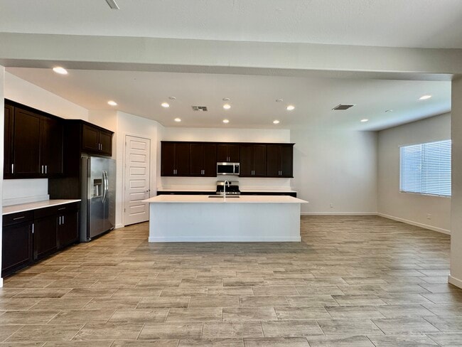 Kitchen and dining room - 2996 E Birdsong Ave
