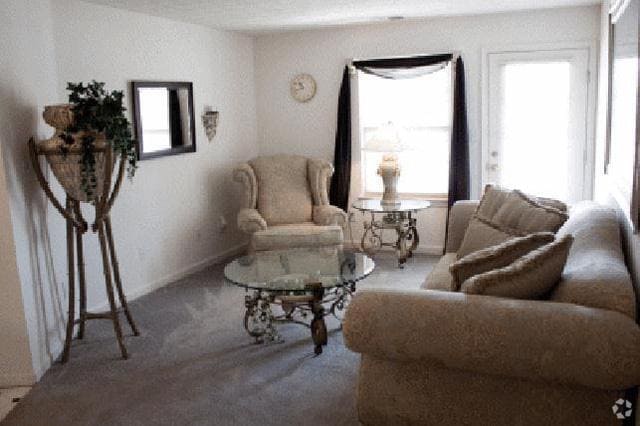 Sala de estar - Stone Ridge Flats and Townhomes
