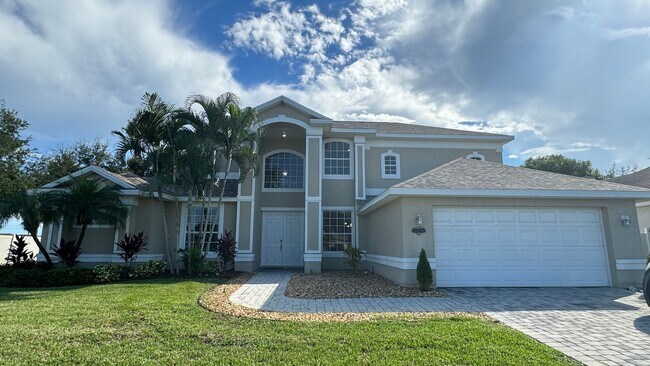 Building Photo - Gated 2-story single family home with pool in gated community, Tamarind Estates!!