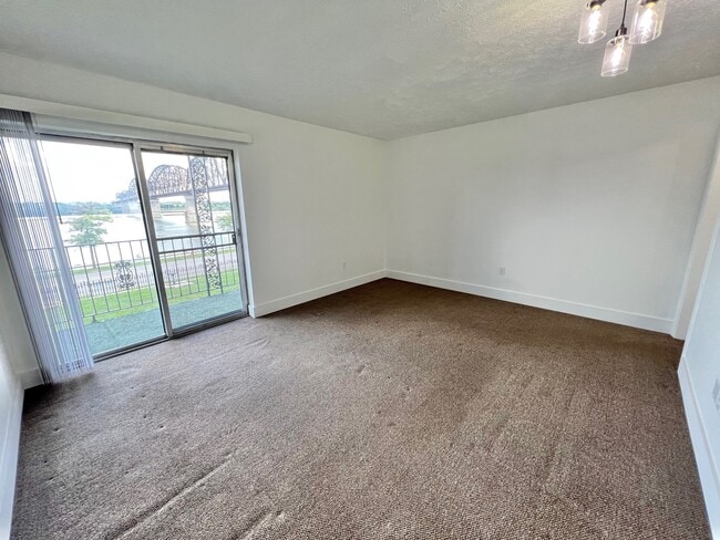 Livingroom with full river view - 212 Riverside Dr