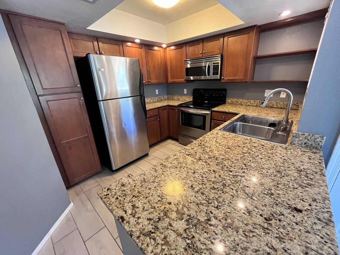 Primary Photo - NE-3 bd/ 2bd Condo in gated community!