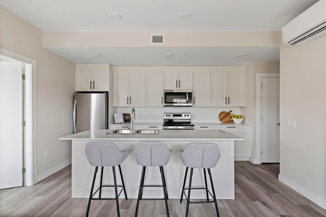 Building Photo - The Rise Apartment Homes