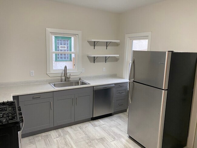 Kitchen, with Stainless Steel Fridge/Freezer and Dishwasher - 3052 California St NE