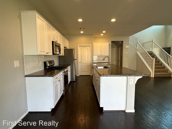 Building Photo - 4 br, 2.5 bath House - 10560 Mount Blackbu...