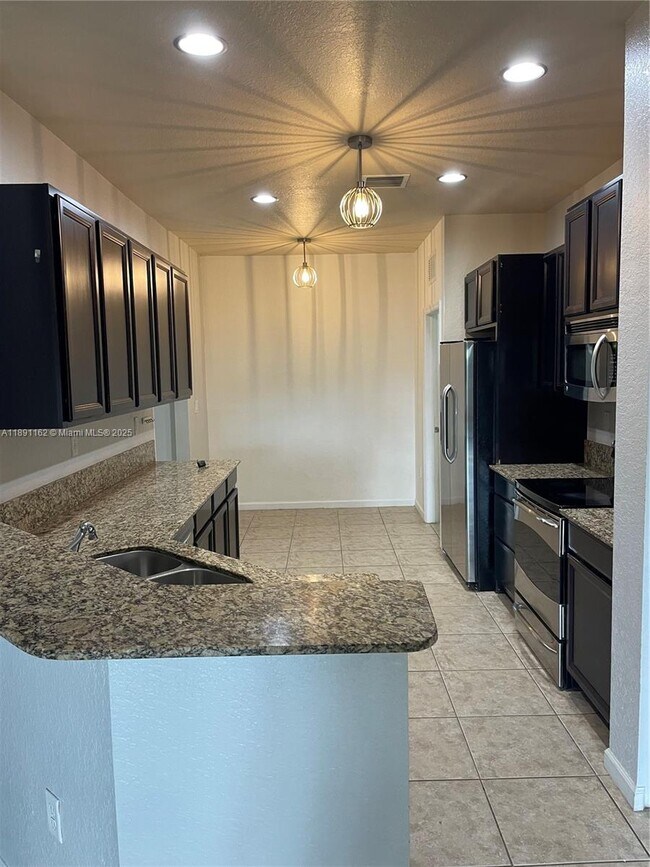 Building Photo - 3448 NE 1st St