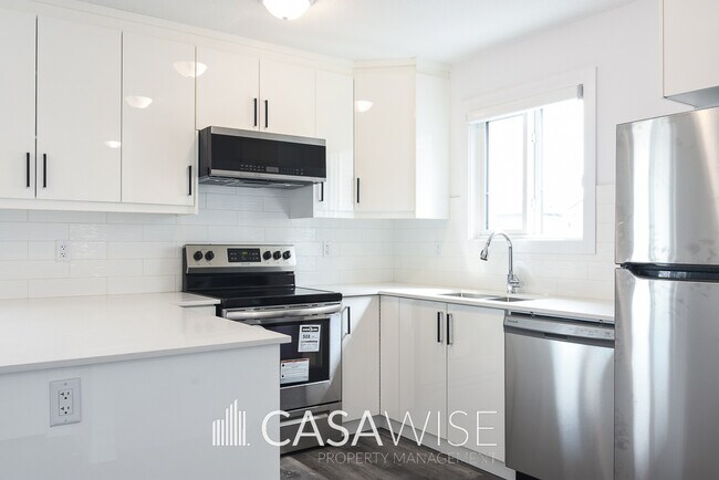 Photo du bâtiment - 6508g-65175 175 Ave NW