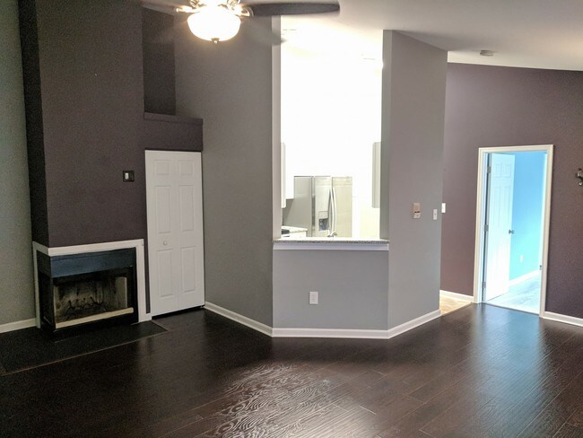 living area into kitchen - 310 Blue Water Ct