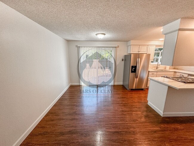 Building Photo - READY NOW! Charming Single-Level 3BD/2BA with Central AC, Wood Fireplace, and Landscaping Included!