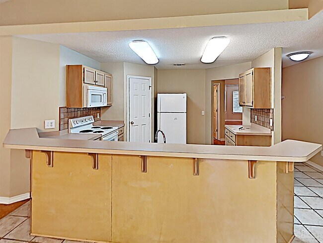 Foto del edificio - 3348 Village Green Dr