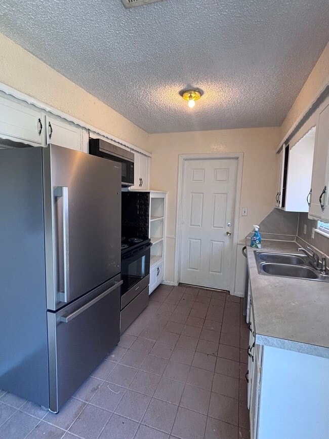 Building Photo - Cozy home in Norman near Norman North High School