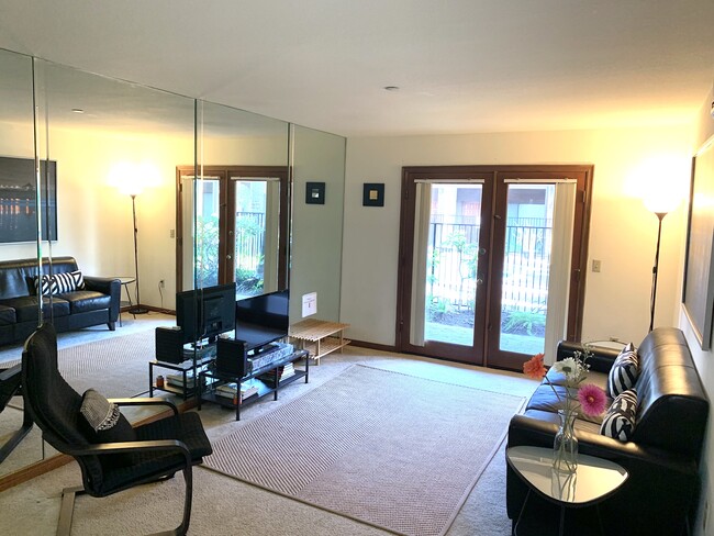Living room with HD TV and plenty of seating - 17200 Newhope St