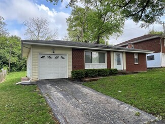 Building Photo - 6911 Pine Ridge Dr
