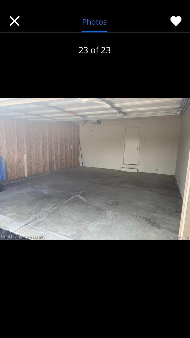 Attached garage inside view - 26025 Pinehurst
