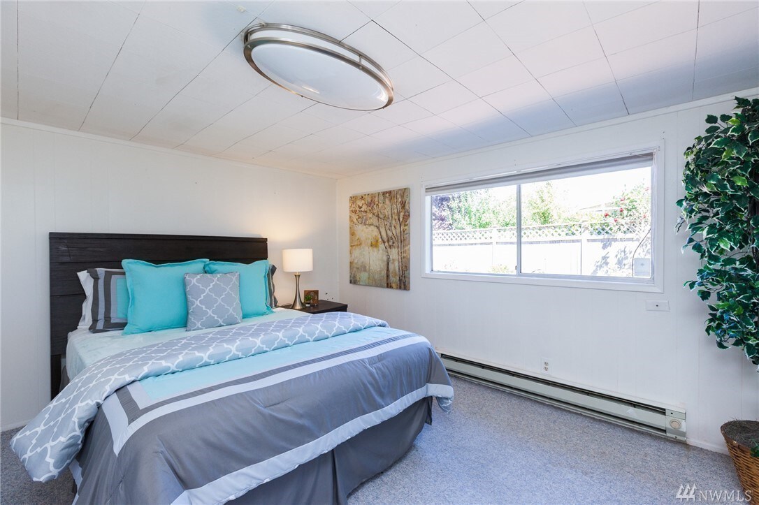 Quiet bedroom with no living space overhead plus large walk-in closet - 2327 46th Ave SW