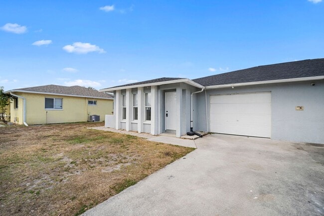 Building Photo - ****SPECIAL 2 WEEKS FREE****  Move-In Ready Cape Coral Home – Newly Remodeled Interior