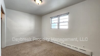 Building Photo - 1201-11 1/2 11 1/2 St N