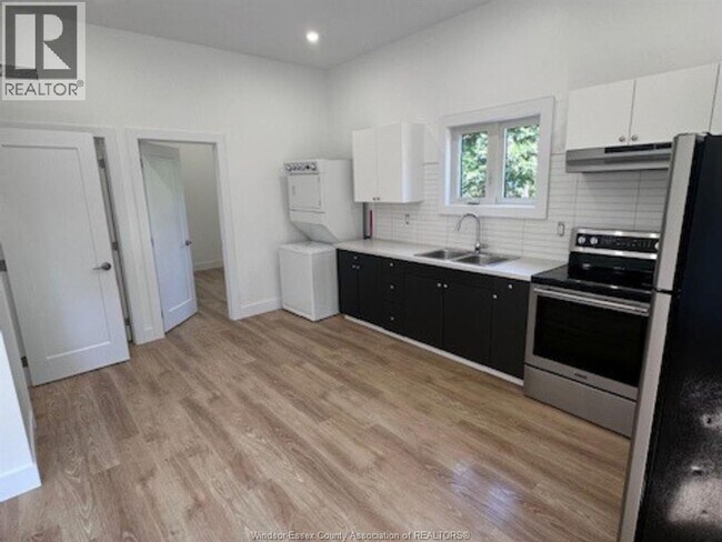 Photo du bâtiment - 1227 Curry Ave