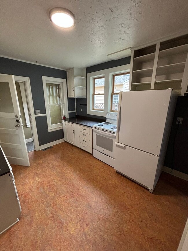 Building Photo - Classic Northside Home with fenced yard an...