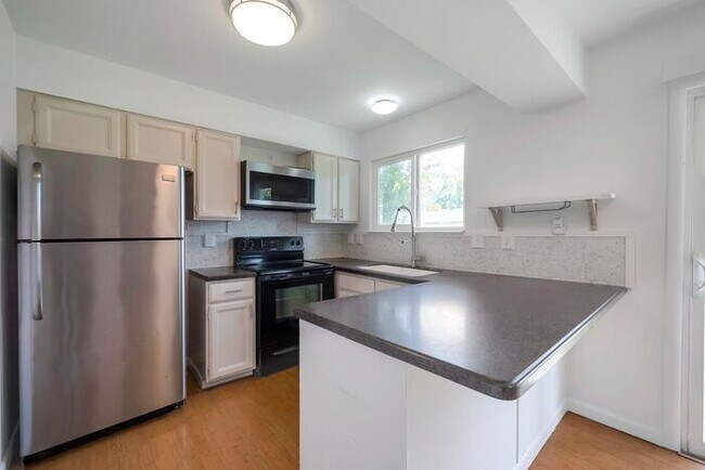 Building Photo - Updated Provo Home w yard + attached 2 car!