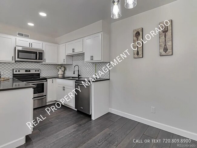 Building Photo - 3613 S Sheridan Blvd Unit 12