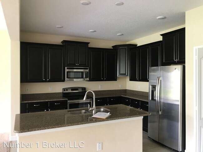 Building Photo - 4 br, 3.5 bath House - 15123 Driftwood Ben...
