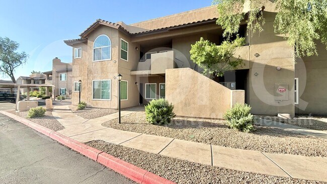 Building Photo - 9451 E Becker Ln