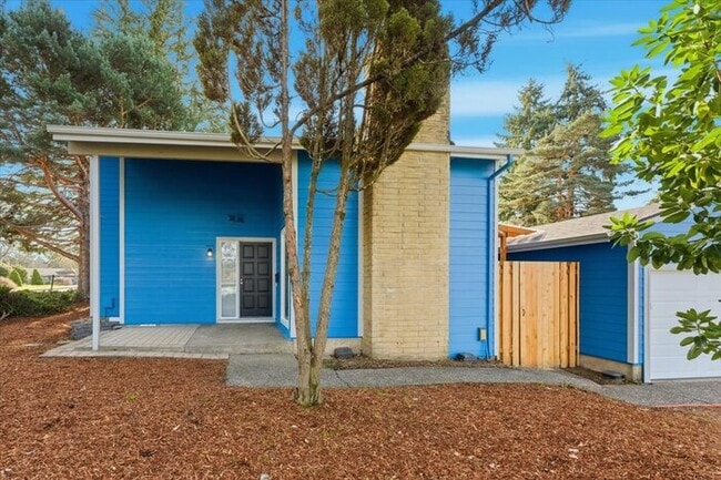 Photo - Updated 3BD/2BA Highland Duplex • Private Garage, Fireplace & Outdoor Space! House