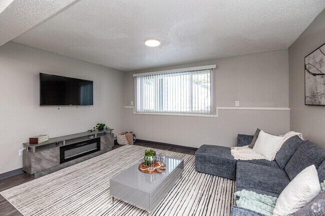2 habitaciones, 1,5 baños - 1012 pies cuadrados - Sala de estar - FREE 2nd Month's Rent When You Apply Within 24 Hours of Your Tour at Weston Park Apartments!