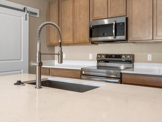 Foto del edificio - Modern 2-Bedroom Condo with Private Patio & Garage in Denver’s Gateway Corridor