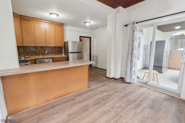 Building Photo - 310 Paterson Plank Rd