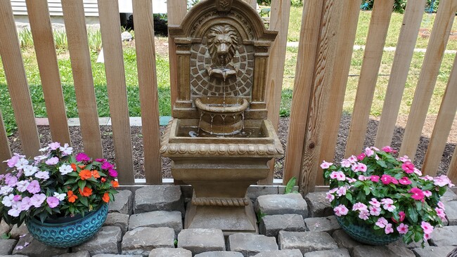 Back patio fountain - 1402 N Girard Ave N