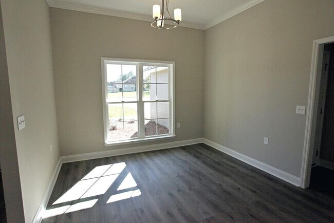 Foto del edificio - Stunning 4-Bedroom Home with Modern Amenit...