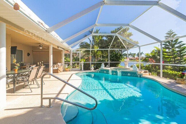 Building Photo - Heatherwood Lake Front Pool Home in St. Lucie West