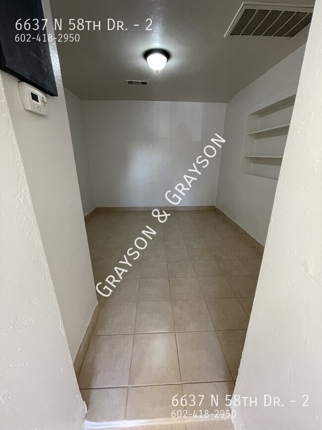 Foto del edificio - 6637 N 58th Dr