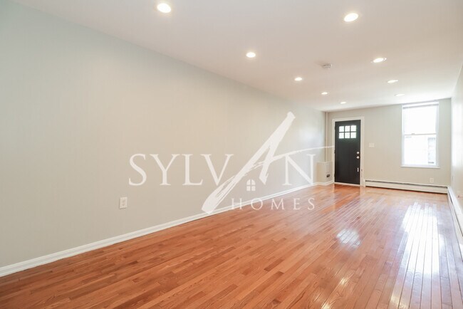 Building Photo - The living is easy in this 2 bedroom, 1.5 ...