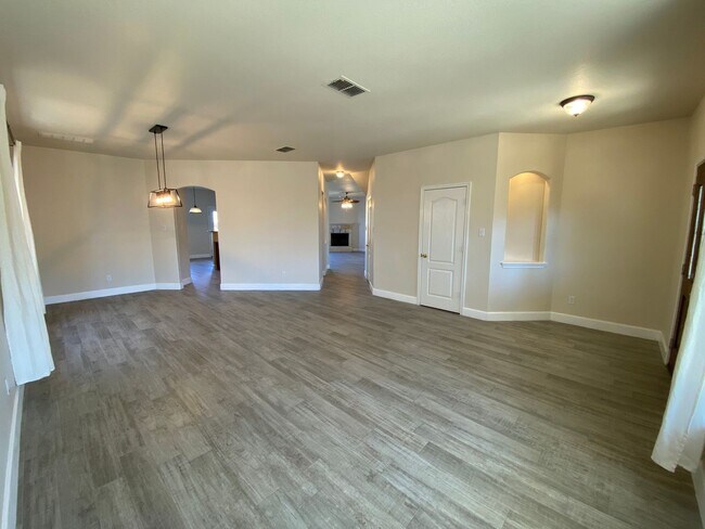 Building Photo - Step into this stunning 4 bedroom, 2.5 bathroom haven that radiates modern elegance and abundant ...