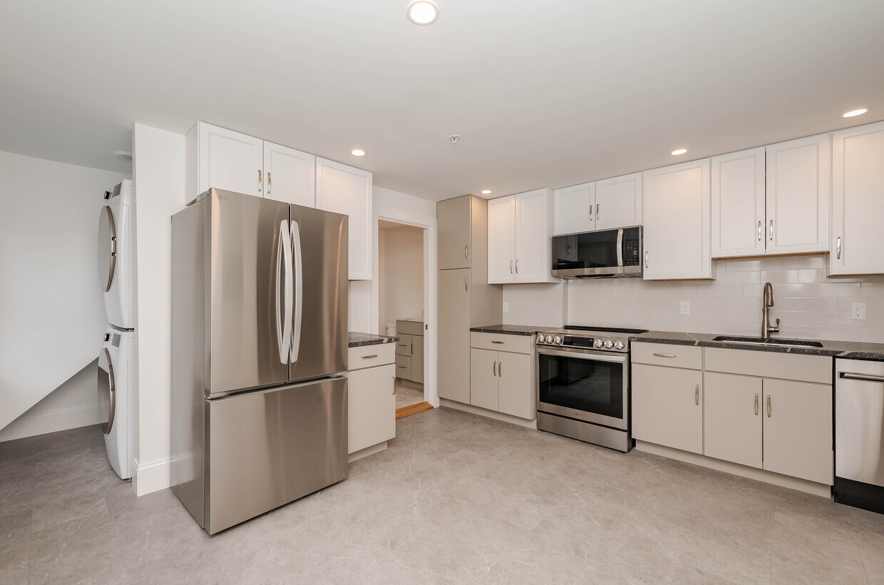 Professional designed custom kitchen with stainless steel appliances - 361 Miller Ave