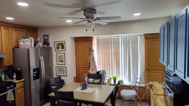 Stainless steel side by side fridge lots of cupboard space. Furniture not included in rental. - 1365 Crafton Ave