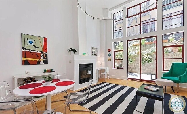 Building Photo - Spacious 1BR|2BA Loft Style Condo in the h...