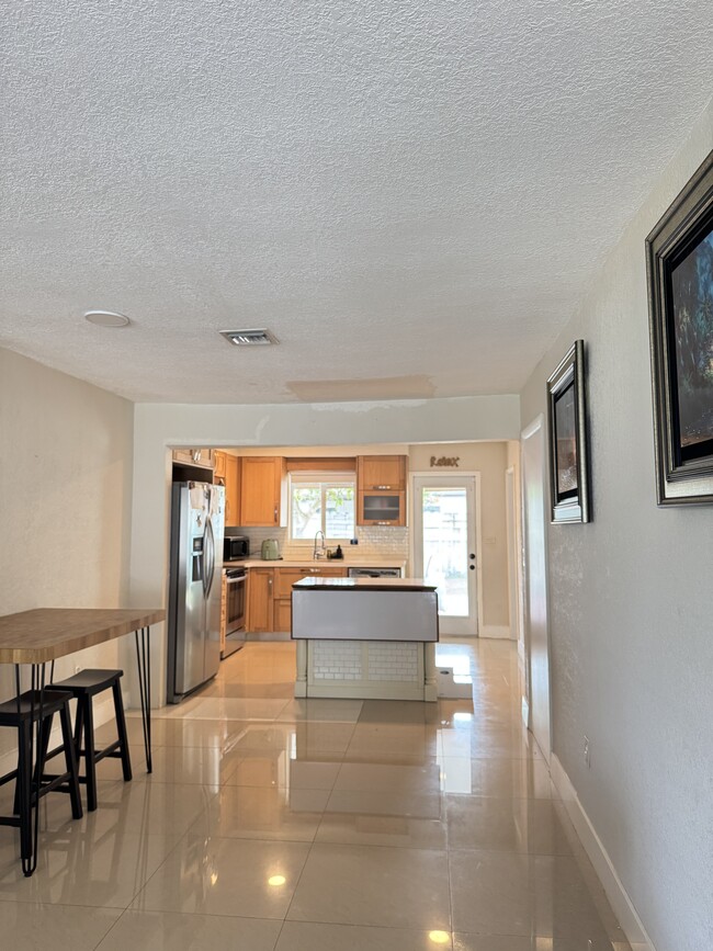 Dinning area/Kitchen - 6880 Raleigh St