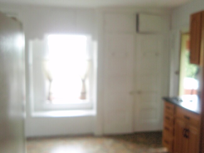 window seat - 310 W College St