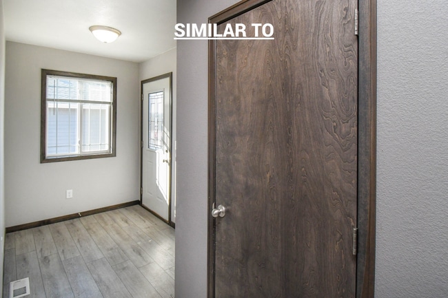 Building Photo - East Sioux Falls 4-Bedroom Townhome – Style, Space & Convenience!