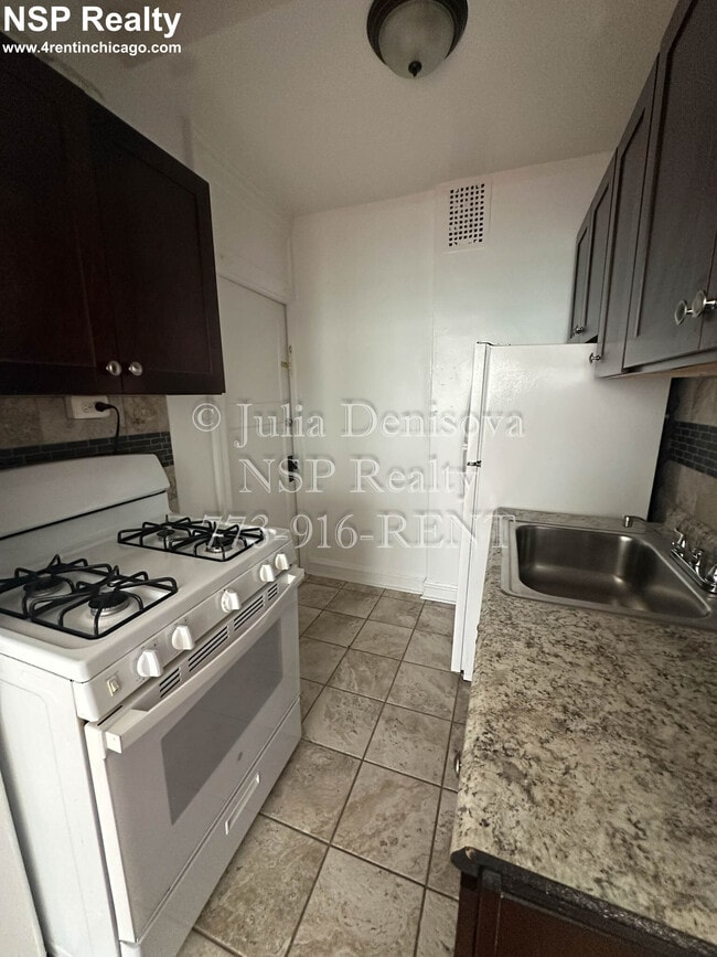 Building Photo - 1369 W Estes Ave