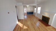 Open Living and Kitchen with Fireplace - 244 Claremont St