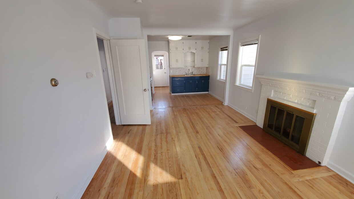 Open Living and Kitchen with Fireplace - 244 Claremont St