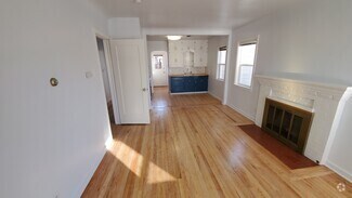 Open Living and Kitchen with Fireplace - 244 Claremont St