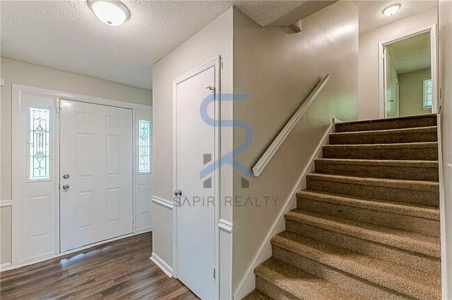 Building Photo - Move in before Janury 15th and choose your reward: a $250 Amazon Gift Card or a 55" Smart TV!