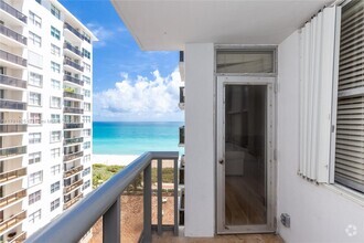 Building Photo - 6039 Collins Ave